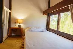 Sypialnia w bungalowie przy plaży